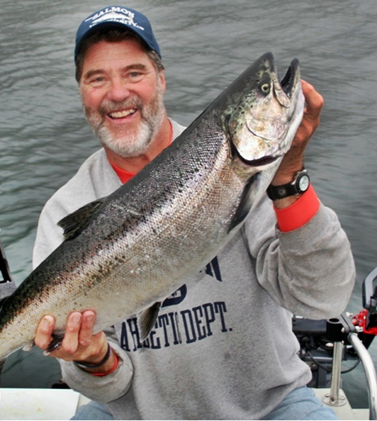 Motor-mooching a plug-cut herring behind a large Spin-n-Glo attractor produced this Sekiu summer chinook.  