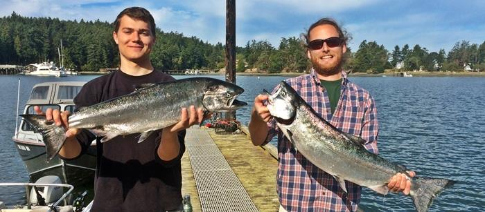 Kyle Hill and Brandon Flew holding a pair o’ Kings. 