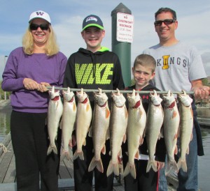 The Loutisis Family with their morning catch of Mackinaw.