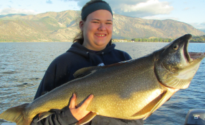 Kendra Opsata (13) of Bothell with a monster laker. She was fishing with her dad, Ken.