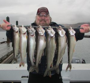 Kevin Nadeau with his morning catch of Lake Chelan Mackinaw.