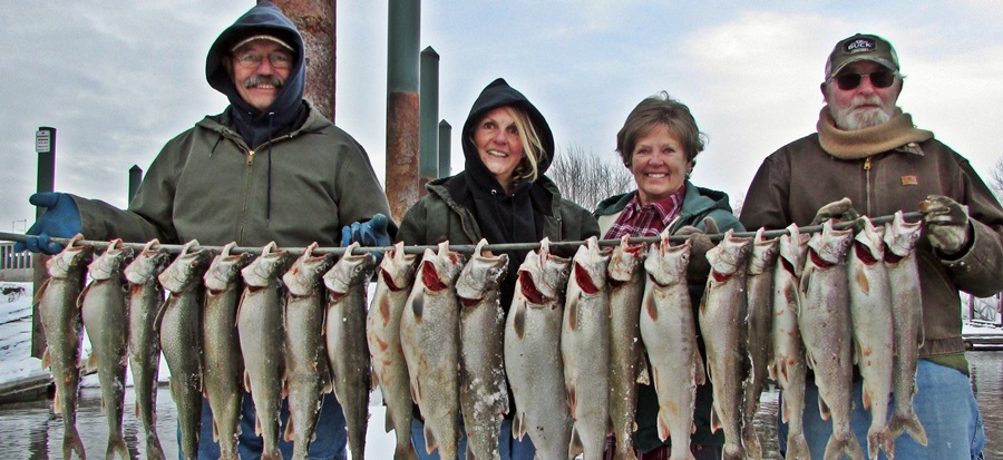 Sonny & Pat Clemmer of Springdale, WA with their friends Caroline & Don Renz of Loon Lake and their epic catch of Lake Chelan Mackinaw.