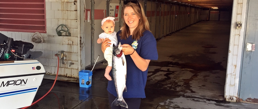 Nancy Franco and her baby; Nancy is a WDFW Fish Checker 